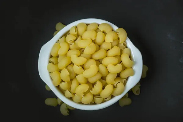 Macaroni Raw White Bowl Black Plate — Stock Photo, Image
