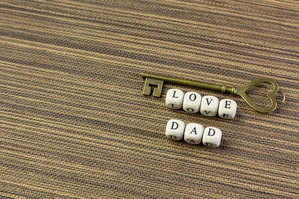 Wooden text  for father day content close up image. — Stock fotografie