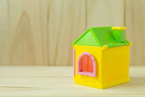 The home toy on wood for property content