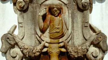 Sanctuary of Bom Jesus do Monte crowns the summit with white baroque church monumental stairway and panoramic views across Braga, Portugal