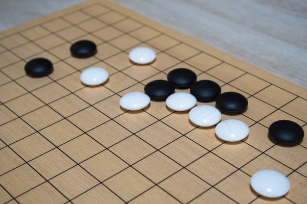 The game of go is enjoyed all over the world.