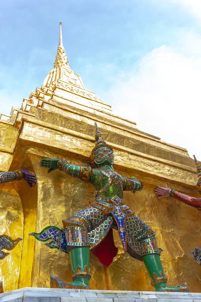 The group of Ramayana demon statue who support the Golden Pagoda in Wat Phra Kaew, Bangkok, Thailand