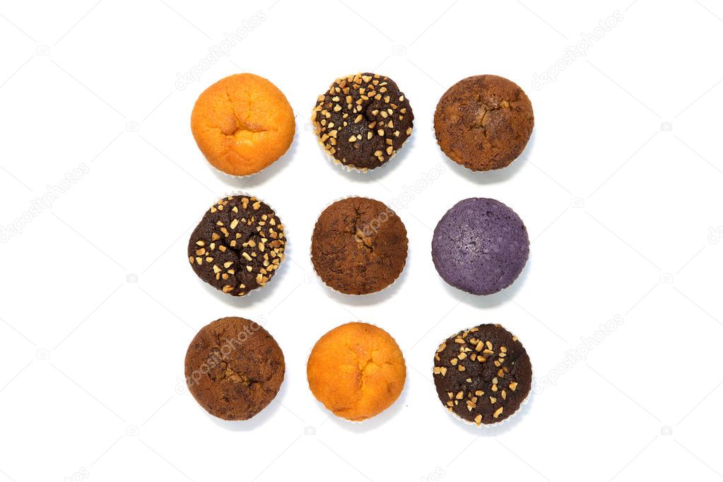 Nine colorful cupcakes from above