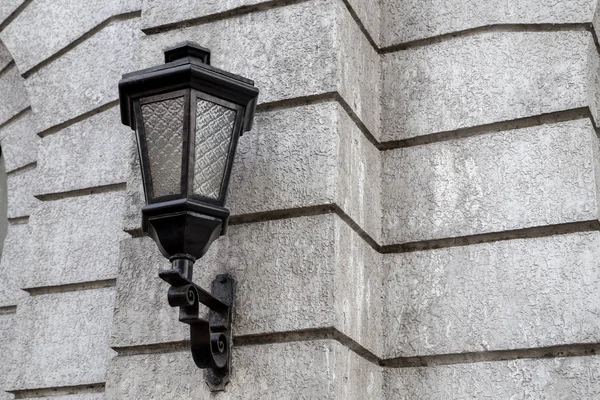 Street lantern on grey concrete  wall