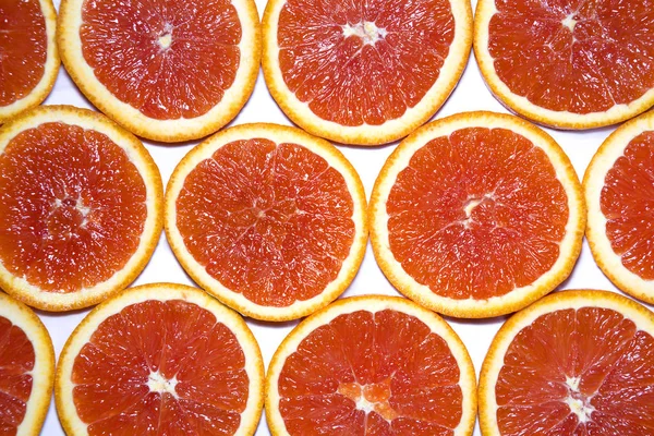 Sliced Red Grapefruit Background Texture — Stock Photo, Image