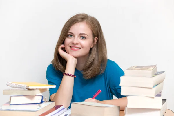 Young caucasian smiling girl woman with many books study at school or university