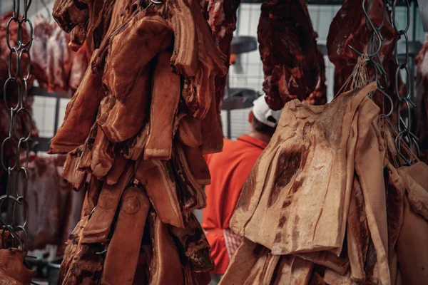 Production of meat products in the supermarket in the supermarket. Next, distribution of finished products to the stores shop for customers. Sausage, meatloaf, pate ...