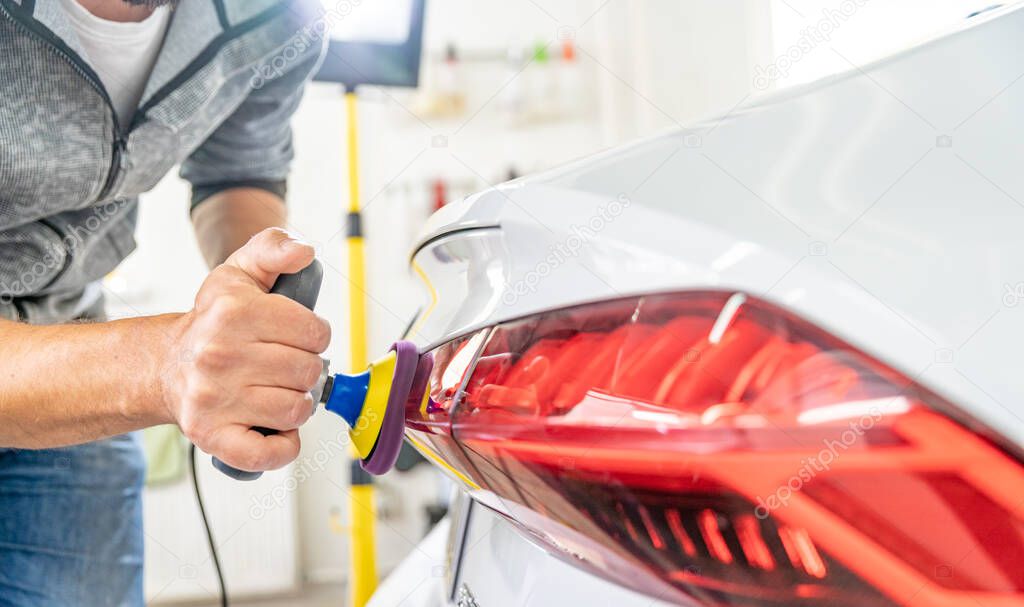 shine restoration and repair of scratches on car taillights with the help of polishing