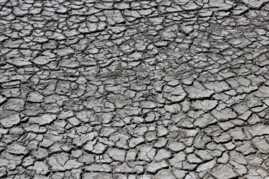toprak metalleri yüzey ve çatlaklar soğuk çamur volkan yanındaki doku. Hangi volkan patlar, çamur tabakası hızla kurur ve beyaz mineral efflorescences ile kapsayan çatlaklar. Kerç
