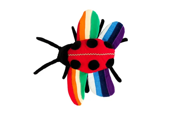 Ladybug sewn by hand based on children's pattern. rainbow wings, isolated on white background. — 스톡 사진