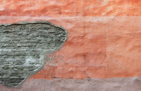 Texturu oranžové zdi. Sádra namalovaná různými odstíny oranžové a zdiva — Stock fotografie