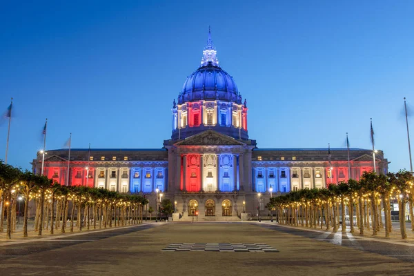 San Francisco City Hall illuminated in Memorial Day Colors. Civic Center Plaza, San Francisco, California, USA.