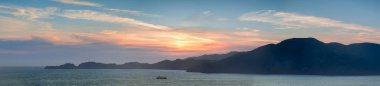 The Marin Headlands Panoramic Sunset as seen from San Francisco. Sausalito, Marin County, California, USA. clipart