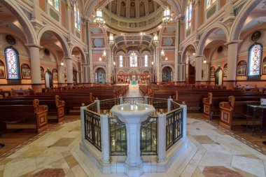 Sacramento, California - July 6, 2018:  Nave of Cathedral of the Blessed Sacrament. Cathedral of the Blessed Sacrament in Sacramento is a cathedral of the Roman Catholic Church in the United States. clipart