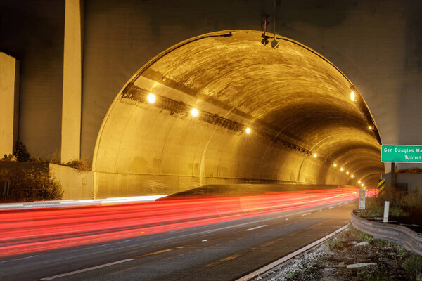 MacArthur Tunnel Traffic. Car Light Trails entering Presidio Tunnel (AKA MacArthur Tunnel) in San Francisco.