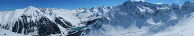 a beautiful skitouring in winter alps in austria clipart