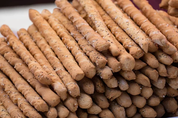 a big heap of taasty salty sticks on the market