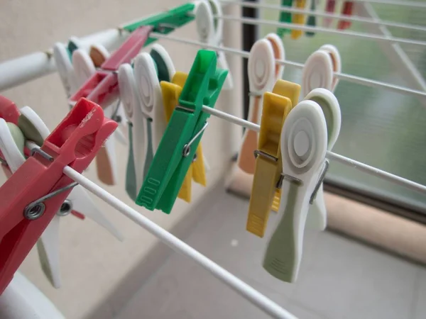 Many Colorful Clothes Pegs White Line Dryer — Stock Photo, Image