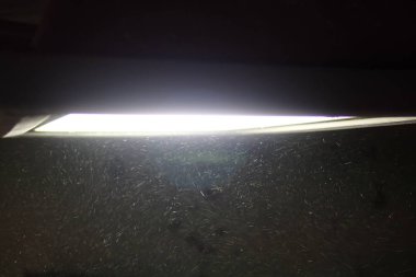 tozlu bir ortamda Brigh ışık soyut detay