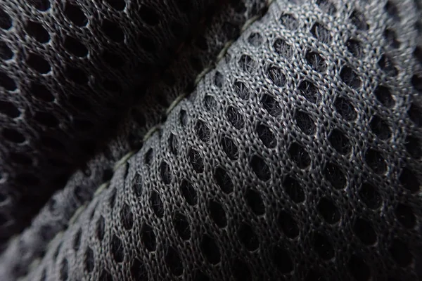 Delikli gri kumaş dokusuna — Stok fotoğraf