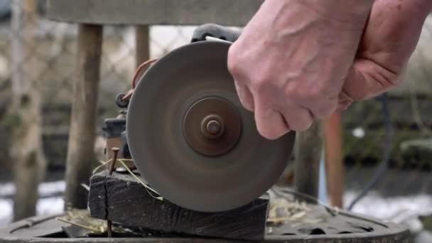 Man Sharpens Detail Grinder Bench Grinder — Stock Video