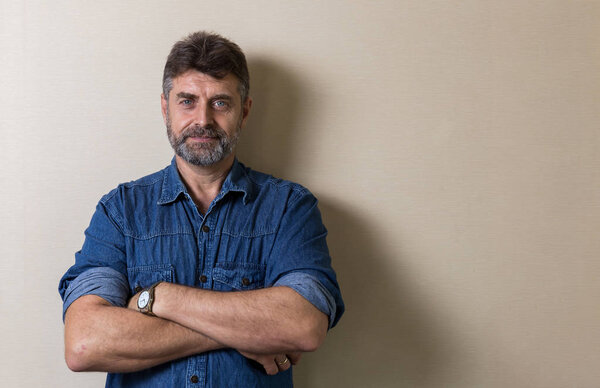 Smiling senior caucasians man relaxing in home