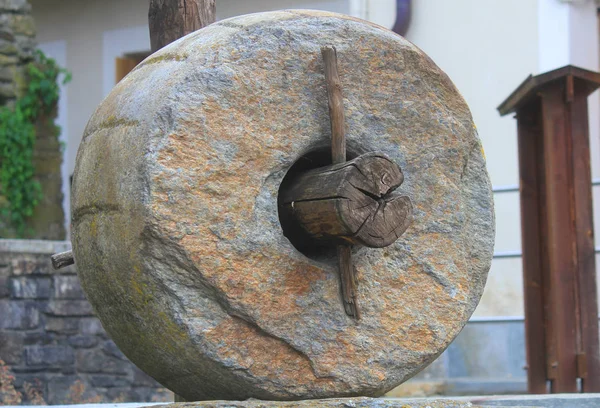 a stone wheel with trunk