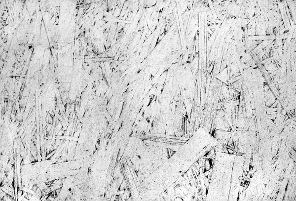 Grunge texture of oriented strand board, OSB. White background from pressed wooden panel. Painted rough backdrop from wood sawdust. — Stock Image Grunge Texture Oriented Strand Board Osb White Background Pressed Wooden Royalty Free Stock Images