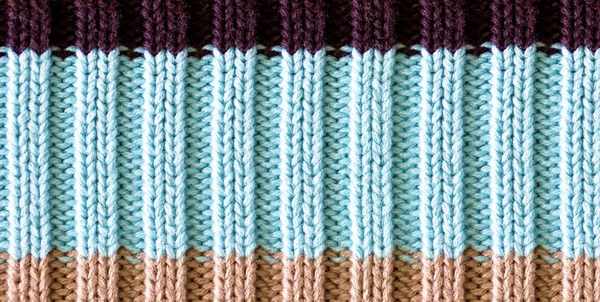 Textura de tejido de lana de punto, tela de lana, suéter de punto caliente a rayas . —  Fotos de Stock