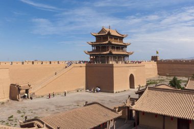 Jiayuguan, China - August 9, 2012: Chinese tourists at the Jiayuguan Fort, in the Gansu Province, China.