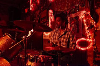 Clarksdale, Mississippi, USA - June 23, 2014: Blues drummer playing at the Reds Lounge in Clarksdale, Mississippi, USA. clipart