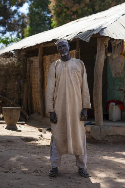 Gabu Region, Republic of Guinea-Bissau - February 7, 2018: Portrait of an old man, in the village of Mandina Mandinga in the Gabu Region, Guinea Bissau