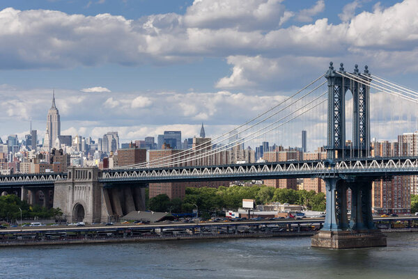 New York City, USA - June 7, 2010: View of the Manhattan Bridge with New York City skyline on the background.