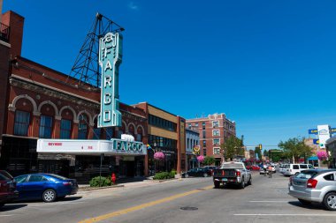 Fargo, North Dakota - August 12, 2014: View of the broadway street with the facade of the Fargo Theatre, in the city of Fargo. clipart