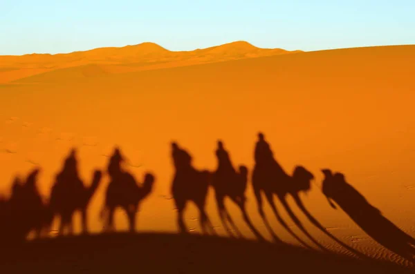 Desert Orange Dunes Silhouettes People Riding Camels — Stock Photo, Image