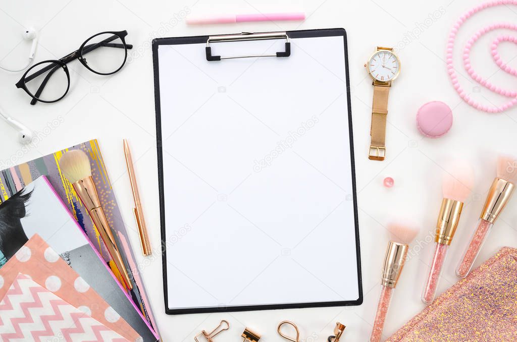 clipboard mockup.Composition with cosmetics, makeup tools, on the table. beauty, fashion, blog and shopping concept. Copy space for lettering or text, whitebackground.