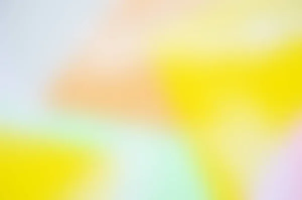 Sommerferienkonzept mit abstrakt verschwommenem, grell buntem Hintergrund. rosa, blau, gelb, orange — Stockfoto