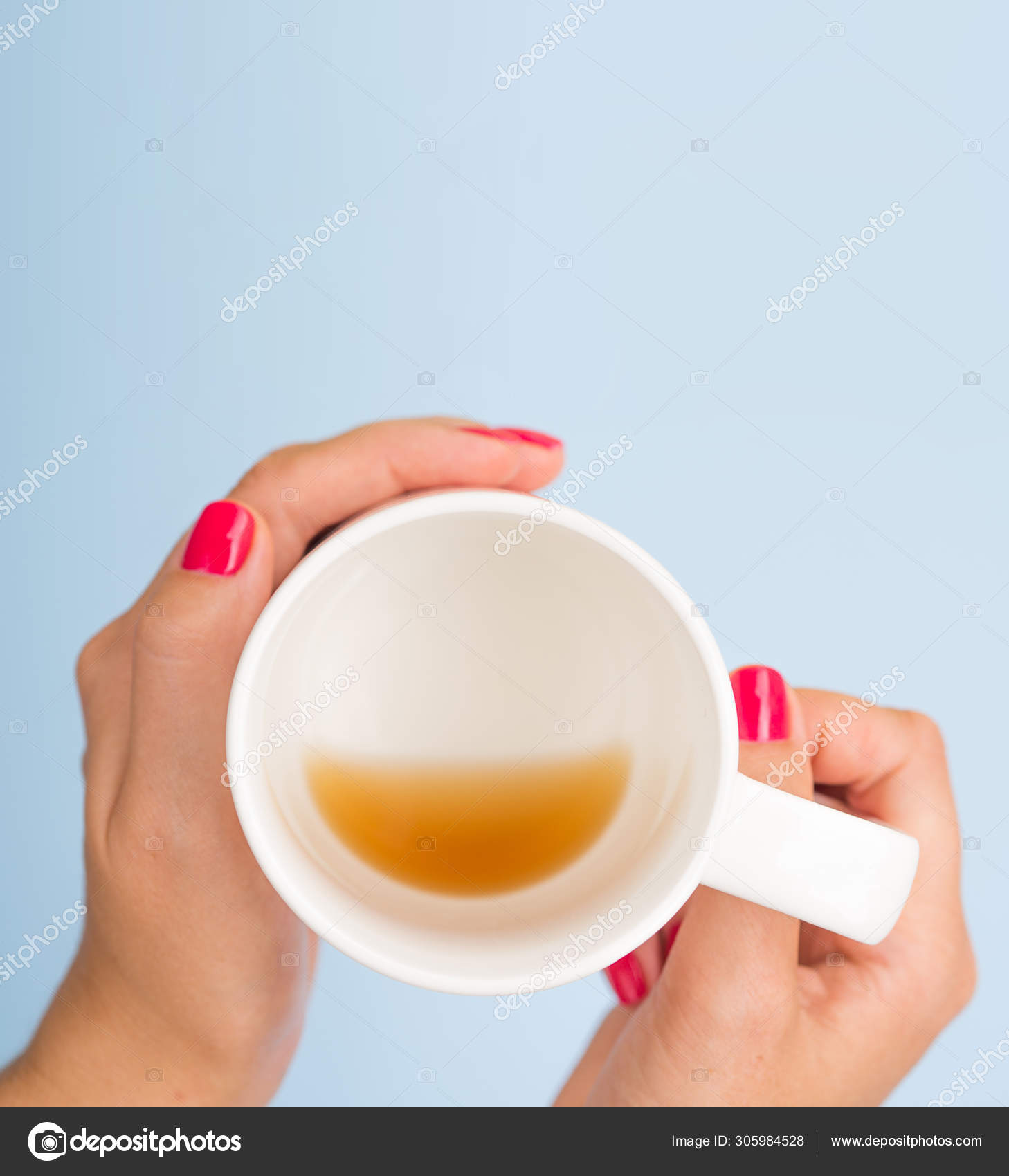 Download Top View Mockup Woman With Red Manicure Nails Holds With An Almost Empty Mug With Coffee Isolated On Blue Flat Lay With Copy Space For Text Stock Photo Image By C