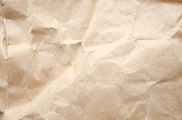 Textura de papel artesanal vista superior. Fondo de papel crema arrugado —  Fotos de Stock