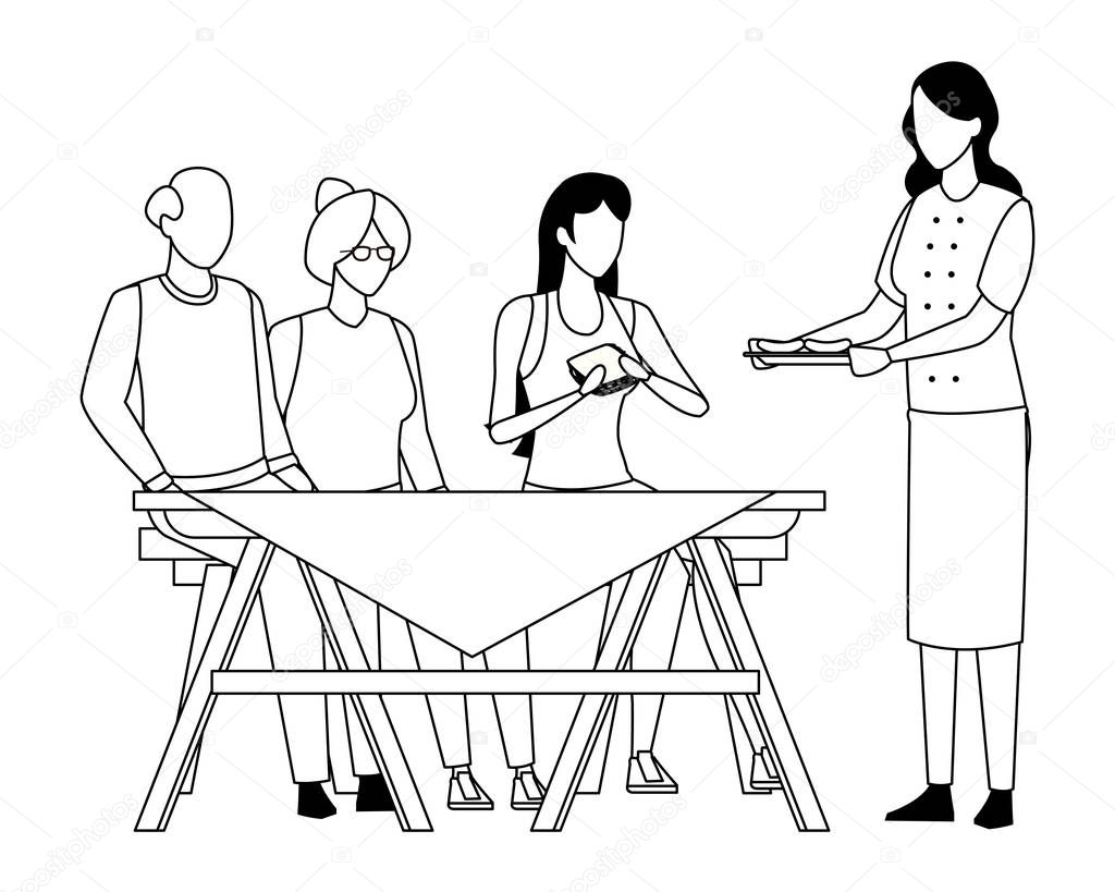 faceless family eating outdoor table in black and white