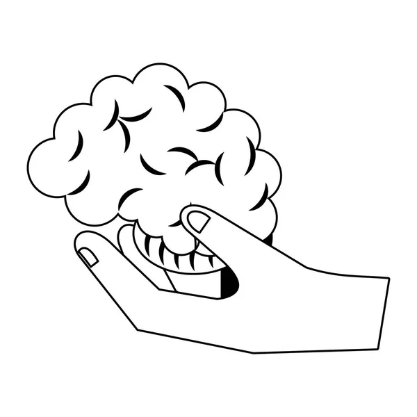 Mão segurando símbolo do cérebro humano isolado em preto e branco — Vetor de Stock