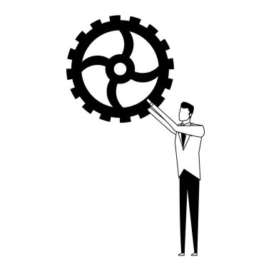 Siyah-beyaz dişli tutan işadamı