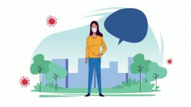 Parktaki kovid19 koruması için tıbbi maske takan genç bir kadın.