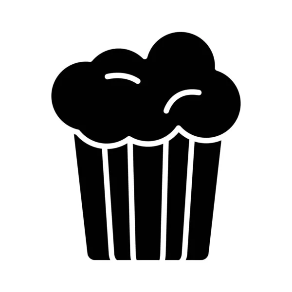 Doce cupcake ícone de estilo silhueta — Vetor de Stock