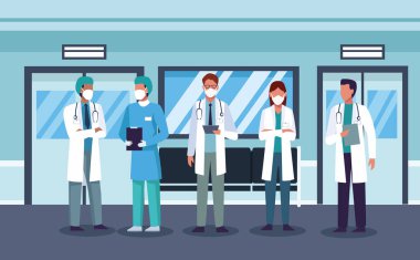 Hastane koridorunda tıbbi maske takan bir grup doktor.