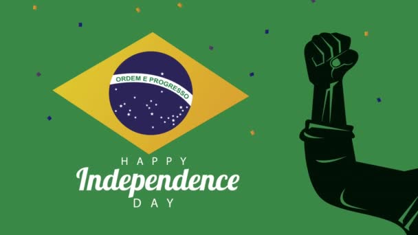 Celebración del día de la independencia de Brasil con bandera y mano fuerte — Vídeo de stock