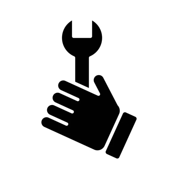 Mão com chave chave ferramenta silhueta estilo ícone —  Vetores de Stock