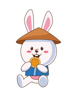 Çin şapkalı ve kurabiye yiyen sevimli bir sonbahar tavşanı.