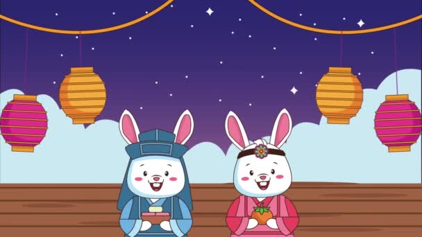 Святкування щасливого чаука з парою кроликів та ліхтарями, що висять — стокове відео
