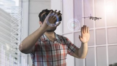 Oturma odası VR kulaklık giyen adam. Hareketleri el ile kullanarak